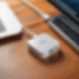 A sleek USB-C network adapter on a wooden desk