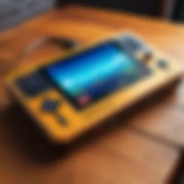 A vintage handheld gaming console on a wooden table